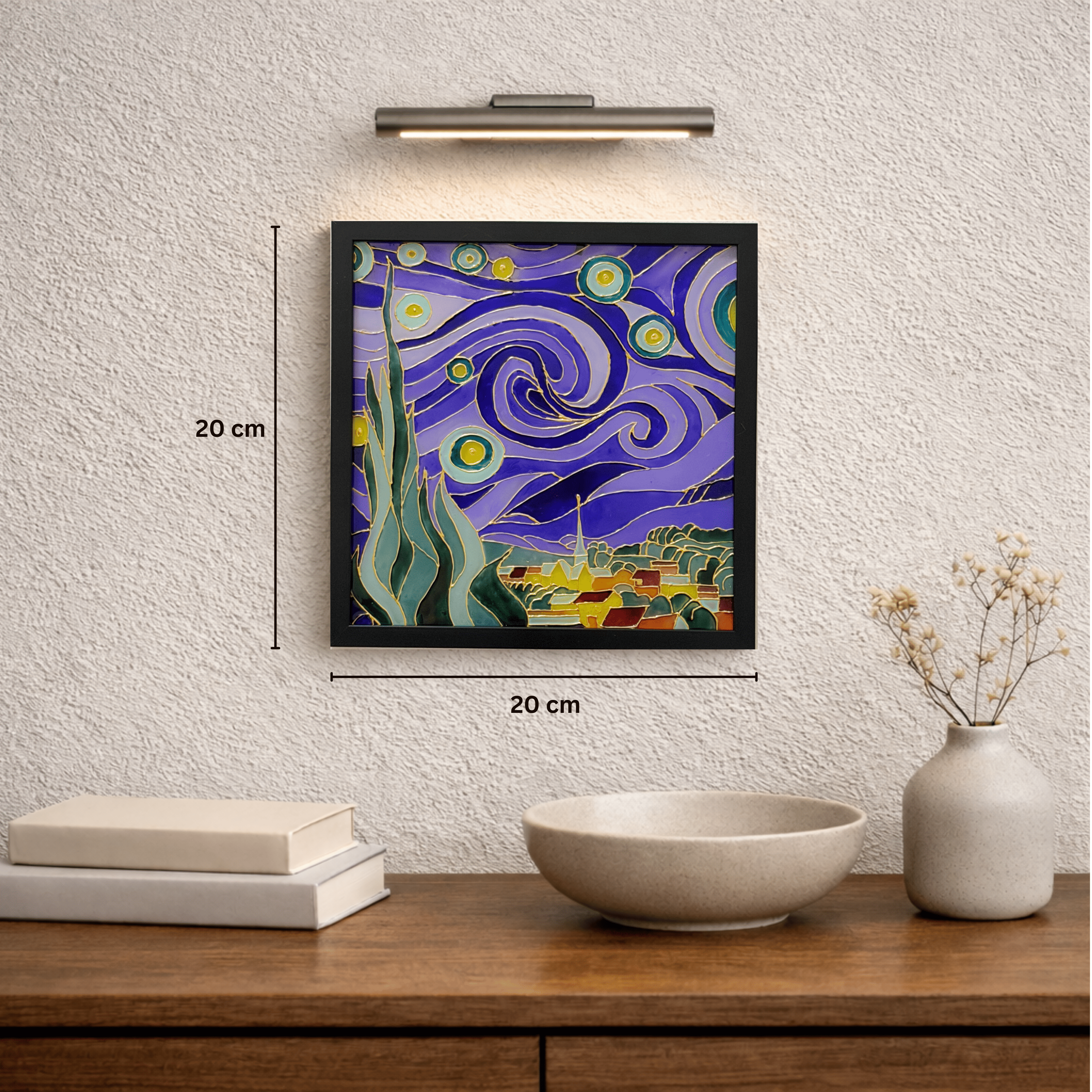 Framed artwork on a wall resembling 'The Starry Night' with swirling patterns and landscape.